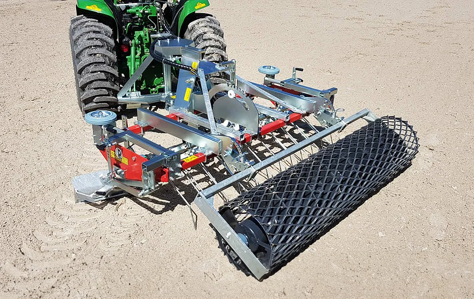 Platz Max Maxi arena leveller attached to a tractor, seen from above