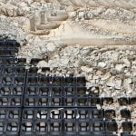 Drain grids that are partially covered by sand