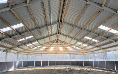 An inside look at a covered, oval round pen