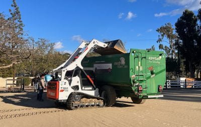 Heavy equipment in action during the construction of the outdoor arena in Malibu.
