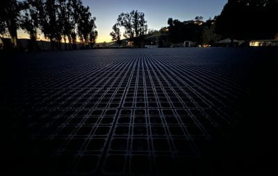 A moody view of the outdoor arena at Malibu while under construction with HIT Draingrids installed.