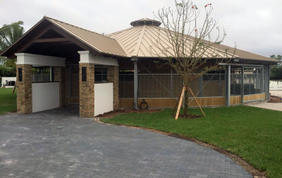 A custom, fully covered horse exerciser