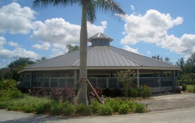 A fully covered horse walker with curb appeal