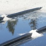 A photo showing the layers of of an ebb and flow watering system operates