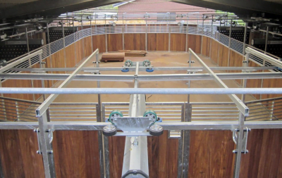 An oval horse exerciser, taken from above, looking at the inside of the walker from the short side