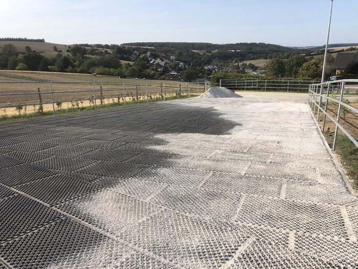 A completed installation of paddock mats