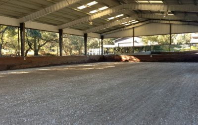 Nicely groomed footing in a covered arena in Woodside.