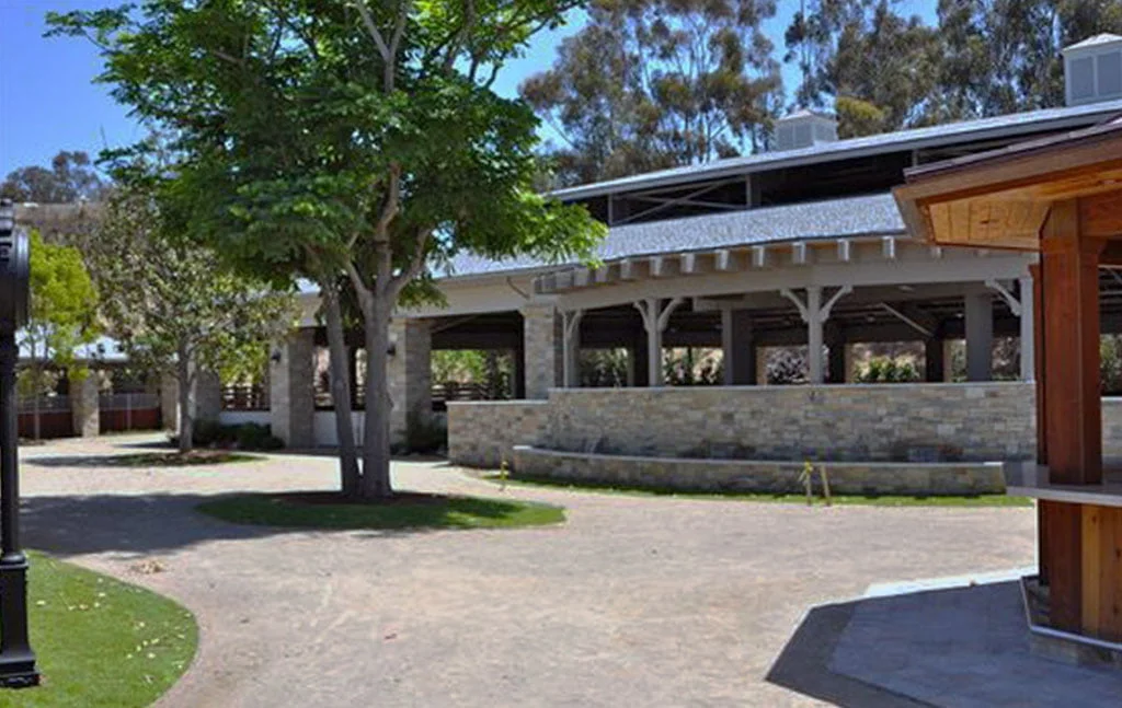 An outside view of the covered arena at Delta Farms.