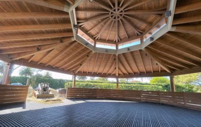 The new round pen at Hope Ranch, with HIT DrainGrids laid, is prepared to have sand added.