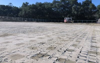 Sand fills barely visible HIT Draingrids as a new arena is being built.
