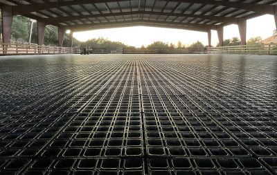 The covered arena at North Peak Arena under construction with HIT DrainGrids laid down.