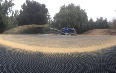 Sand is being laid over the new outdoor arena base at Portola Vallet.