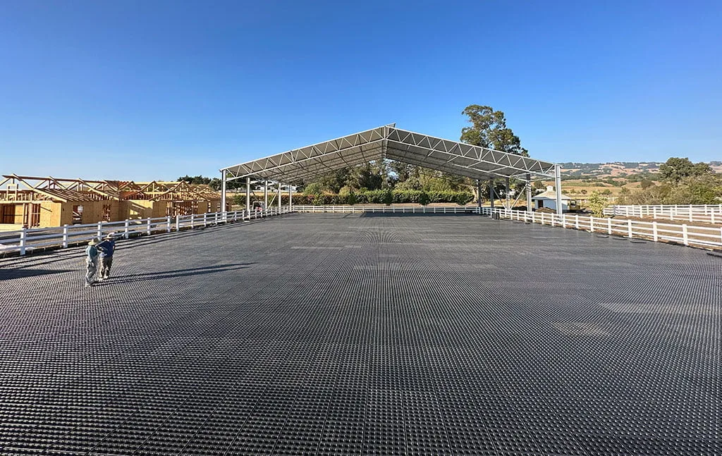 The partially covered arena with HIT Active Aqua under construction and Draingrids laid down.