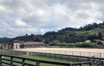 A riding arena at the base of a lovely hill in Pomponio Ranch.